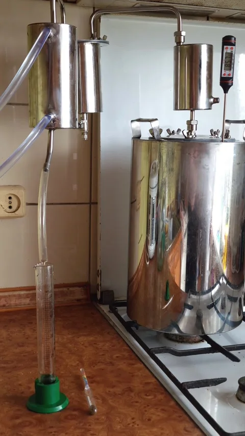 Home Distillation Apparatus Producing Moonshine Stock Footage 308737997