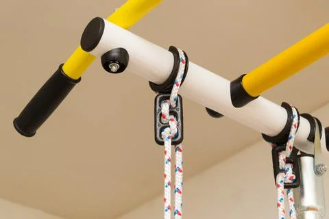 Home exercise machine for children. Horizontal bar for sports. Stock Photos
