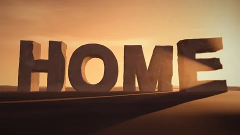 Home Giant Eroded Stone Letters Standing in a Desert at Sunset with Volumetric Stock Footage 342220821