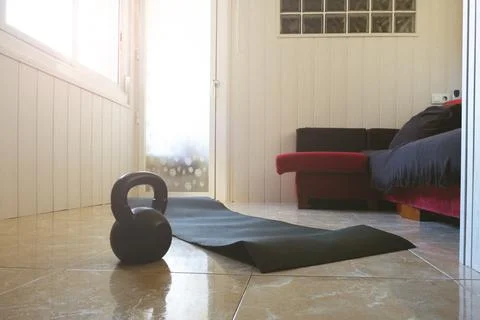 Home gym concept. Instruments to do gymnastics indoors. Stock Photos