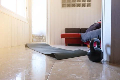 Home gym concept. Instruments to do gymnastics indoors. Stock Photos