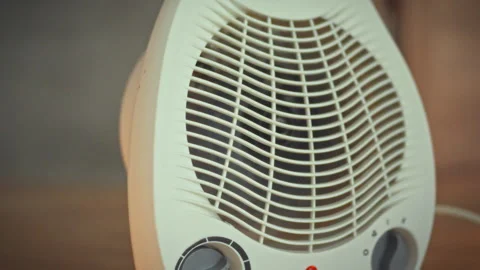 The home heaters integrated fan and heating element work together in full op Stock Footage 331363632