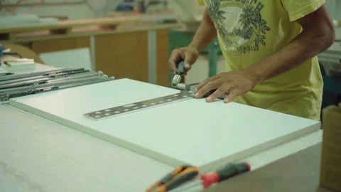 Home improvement. assembling and fitting Kitchen Cabinets Stock Footage 77650259