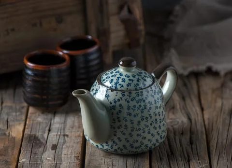 Home interior coffee table with tea cups and tea pot or kettle isolated on wo Stock Photos