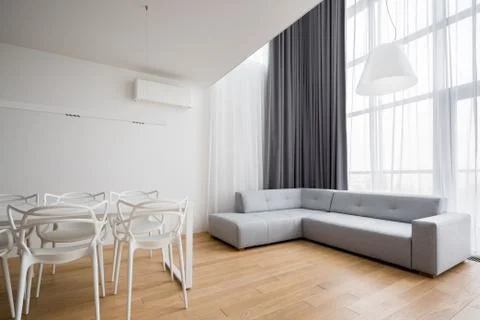 Home interior with corner sofa Stock Photos