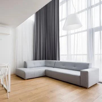 Home interior with corner sofa Stock Photos
