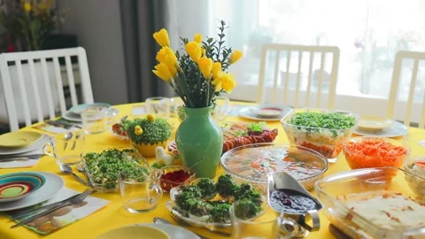 Home interior with easter decor. Spring flowers in a vases. Traditional Easter Stock Footage 242162265