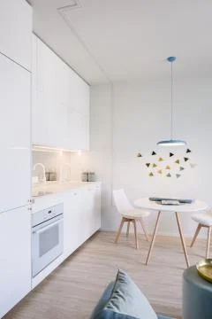 Home interior with open kitchen Stock Photos