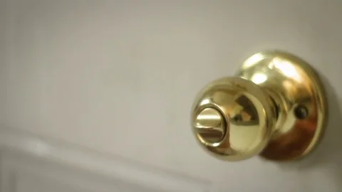 Home Invasion concept - murderer opens kitchen door to home and cocks pistol as  Video stock 75807788