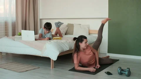 Home Isolation, Distance Learning, Remote Work, Fitness at Home, Online Training Stock Footage 144105929