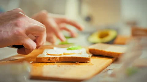 In a home kitchen a chefs skilled hands prepare a nutritious breakfast by ma Stock Footage 333501121