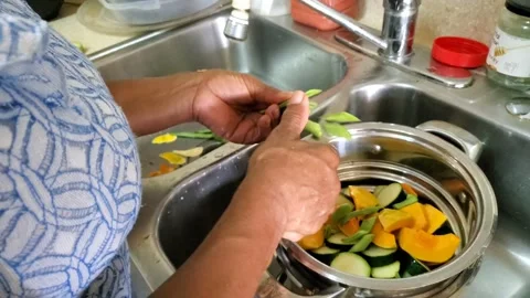 Home Kitchen food prep with vegetables diversity sequence Stock Footage 133854760