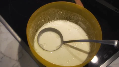 At home in the kitchen on a frying pan from wheat flour prepared thin pancakes Vídeos de archivo 158513629
