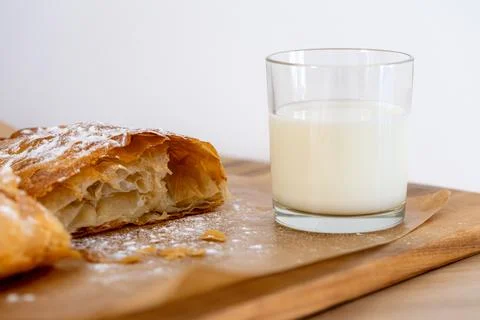Home made bakery with a crispy crust and a glass of milk Stock Photos