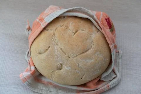Home made bread with heart on the crust Stock Photos