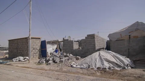 Home made with bricks in a refugee camp in Sulaymaniah - Iraqi Kurdistan Stock-Footage 75908792