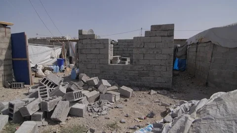 Home made with bricks in a refugee camp in Sulaymaniah - Iraqi Kurdistan Stock Footage 75908801