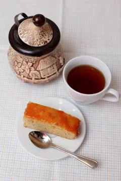A home-made cake with a cup of tea Stock Photos