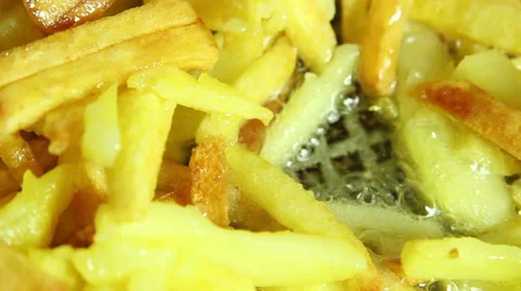 Home Made French Fries. Frying French Fries In Boiling Oil Stock Footage 59306018