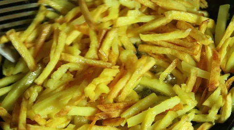 Home Made French Fries. Frying French Fries In Boiling Oil Stock Footage 59306138