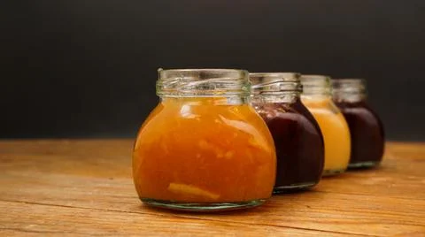 Home-made jam, selective focus. Jars with marmalade, confiture. Sweet dessert Foto stock