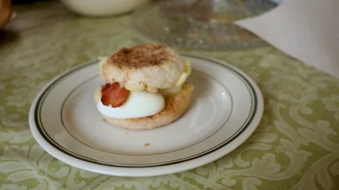 Home made meat lovers breakfast sandwich Stock Footage 128783044