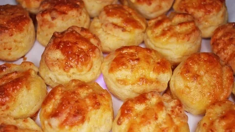 Home made scone scones on rotating plate seamless looping hd background cover Stock Footage 107617250