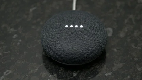 Home Mini Smart Speaker Voice Assistant Device Lighting up Video stock 104119085