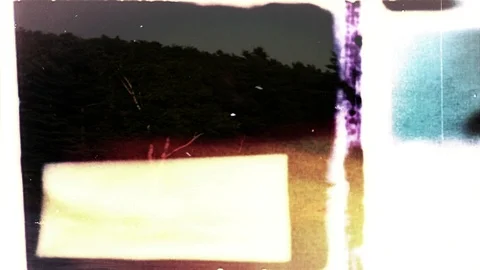 Home Movie 0201: Retro 8mm Home Movie with Film Burn Stock Footage