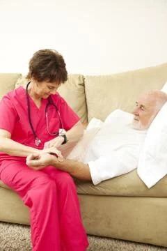 Home Nursing - Taking Pulse Stock Photos