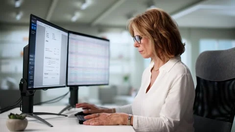 Home Office Accountant Using Software To Manage Invoices Stock Footage 314525881