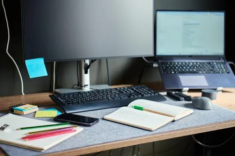 Home office desk with computer, notebook and stationery Stock Photos