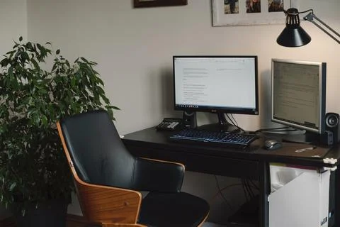 Home office room with computer, supplies, decorations and plants at home Stock Photos
