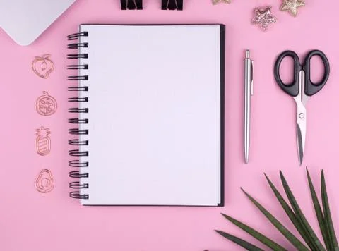 Home office, stationery, Notepad, computer, flower on pink background, copy Stock Photos