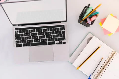 Home office work table with laptop and others Stock Photos