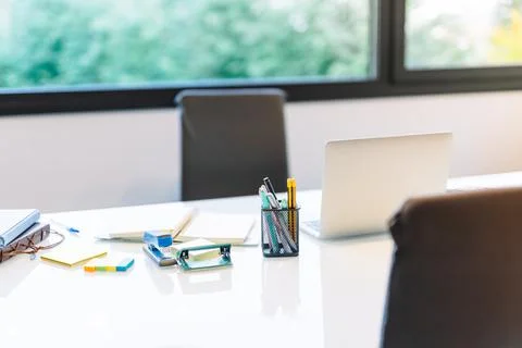 Home office work table with laptop and others Stock Photos
