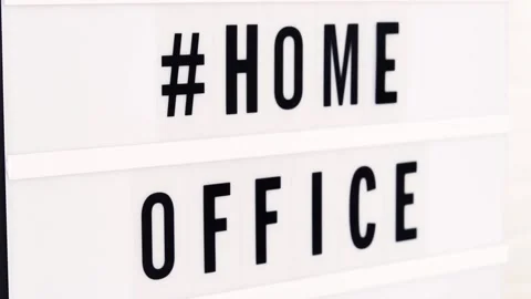 Home Office written in a lightbox text. Quarantine and isolation. Covid-19. Stock Footage 133600044