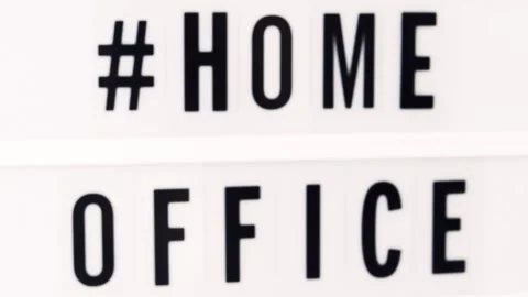 Home Office written in a lightbox text. Quarantine and isolation. Covid-19. Stock Footage 133600049