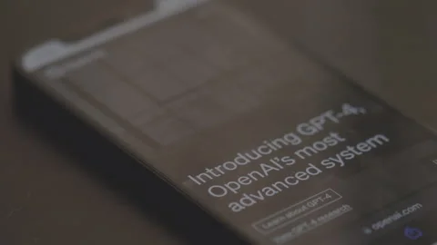 Home page of Chat Gpt by Open Ai on smartphone. Closeup shot Stock Footage 240646573
