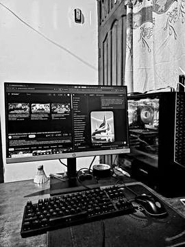 Home PC setup with monitors and accessories Stock Photos