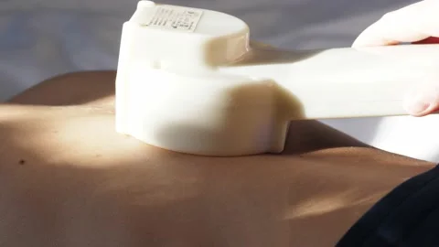 At-home physical therapy process . Current treatment device. Stock Footage 233233186