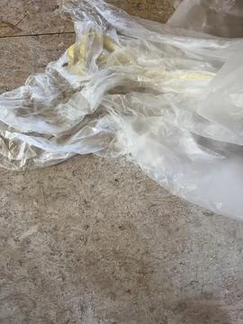 Home Remodeling Essentials: Protective Plastic Sheeting on Floor Stock Photos