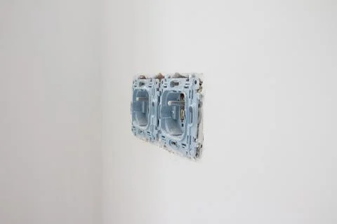 Home renovation, socket, electricity, socket installation Stock Photos