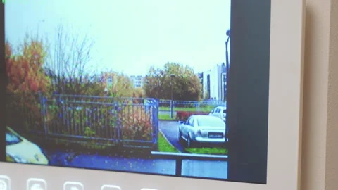 Home Security Active: Video Intercom Buzzes Softly, Showing Live Feed Outdoors Stock Footage 320848458