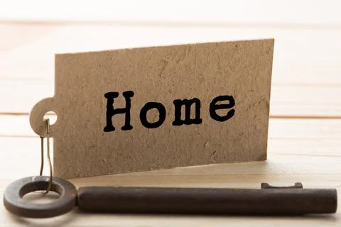 Home security concept - old key with tag Foto stock