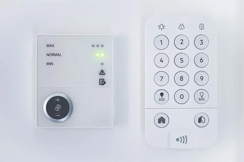 Home security panel keypad and air conditioning panel Stock Photos