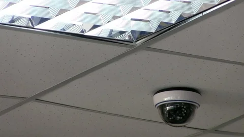 Home Security System Camera Hangs From Ceiling Stock Footage 74009921