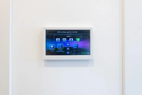 Home Security Touchscreen Alarm Control Panel On Wall For Smart Home Monito.. Stock Photos