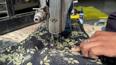 Home Sewing Machine Stitching Fabric Close-Up | Cinematic Crafting Shot Stock Footage 321674268