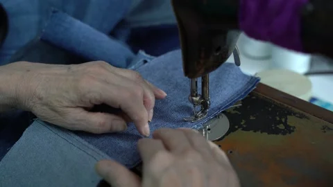 Home sewing on a sewing machine, close-up Stock Footage 223383625